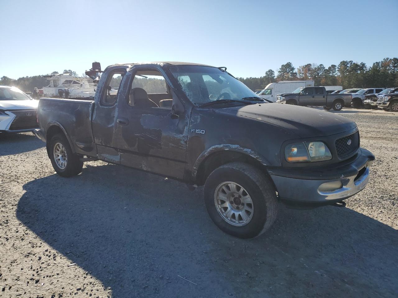 1997 Ford F-150 VIN 2FTEX08L3VCA55297 Copart auction photo, all over damage thumbnail 4