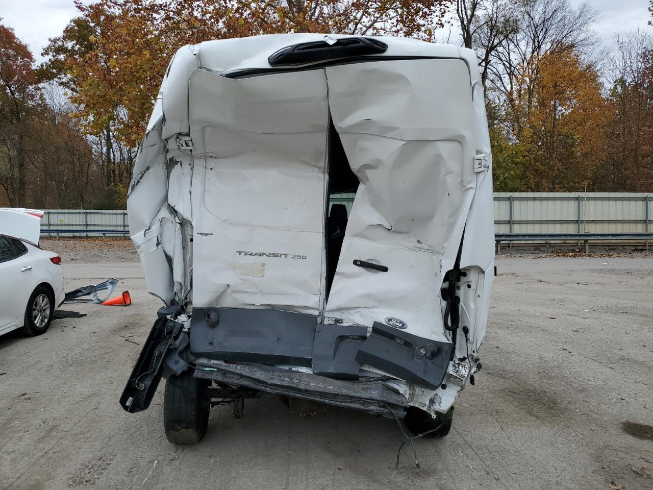 2018 Ford Transit VIN 1FTYR2XM1JKA30515 Copart auction photo, all over damage thumbnail 6