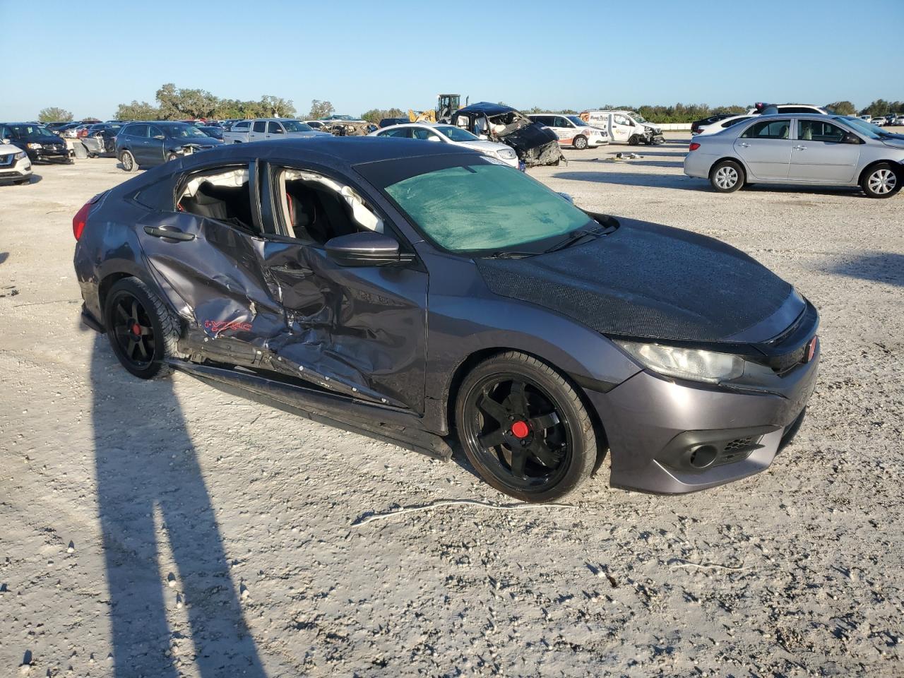 2017 Honda Civic VIN 19XFC2F55HE006721 Copart auction photo, side damage thumbnail 4