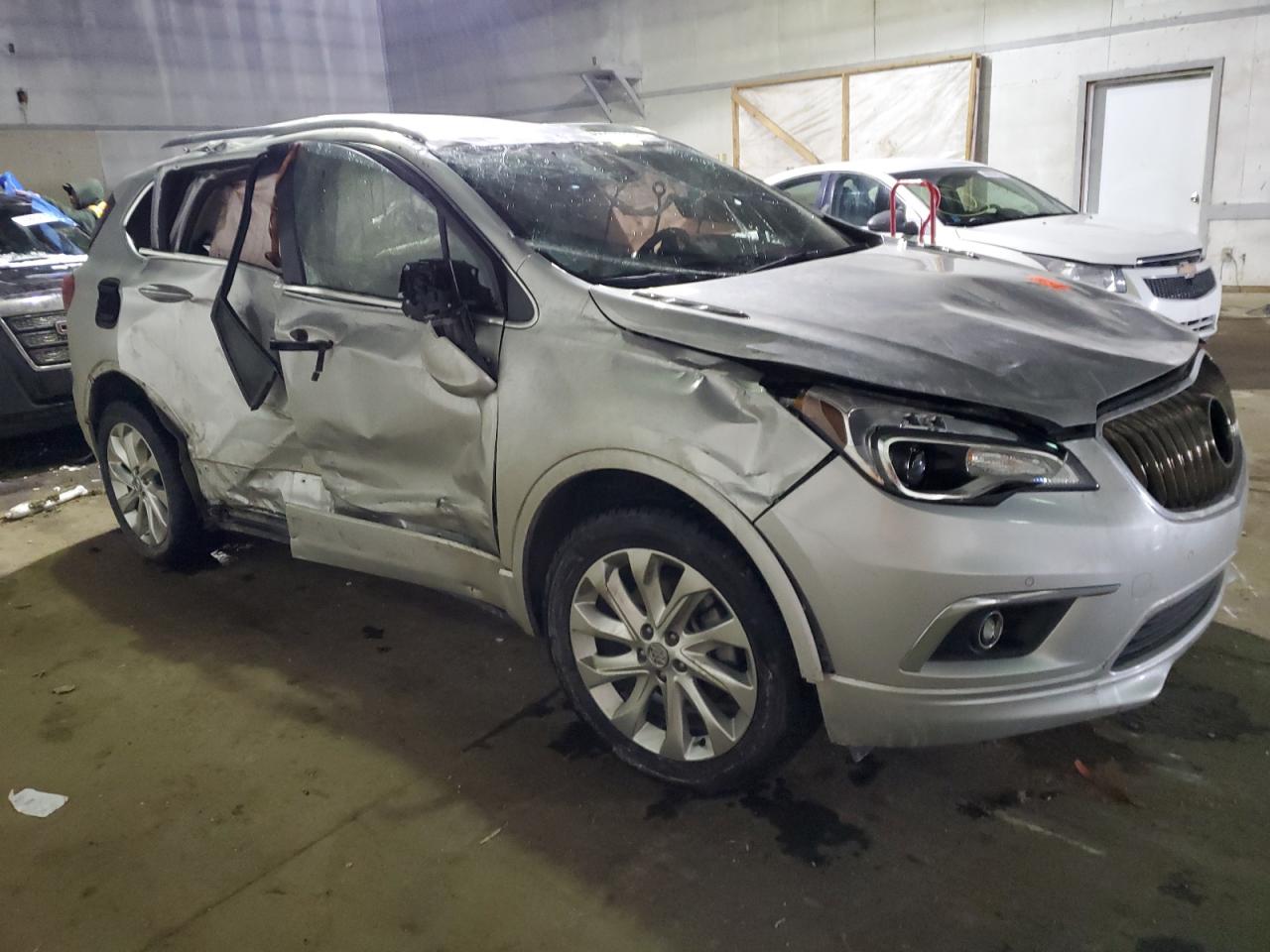 2017 Buick Envision VIN LRBFXESX2HD191744 Copart auction photo, all over damage thumbnail 4