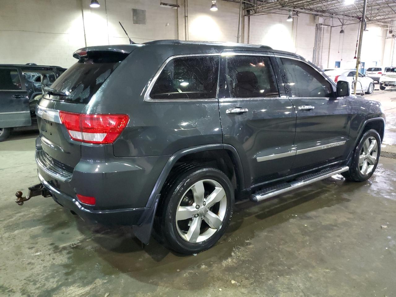 2011 Jeep Grand Cherokee VIN 1J4RR6GG3BC607282 Copart auction photo, side damage thumbnail 3