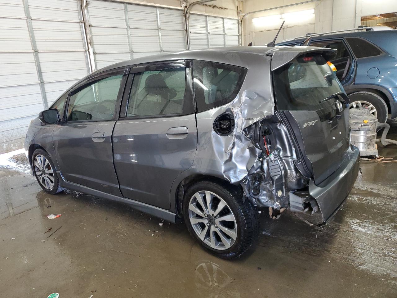 2013 Honda Fit VIN JHMGE8H58DC045270 Copart auction photo, rear end / undercarriage damage thumbnail 2