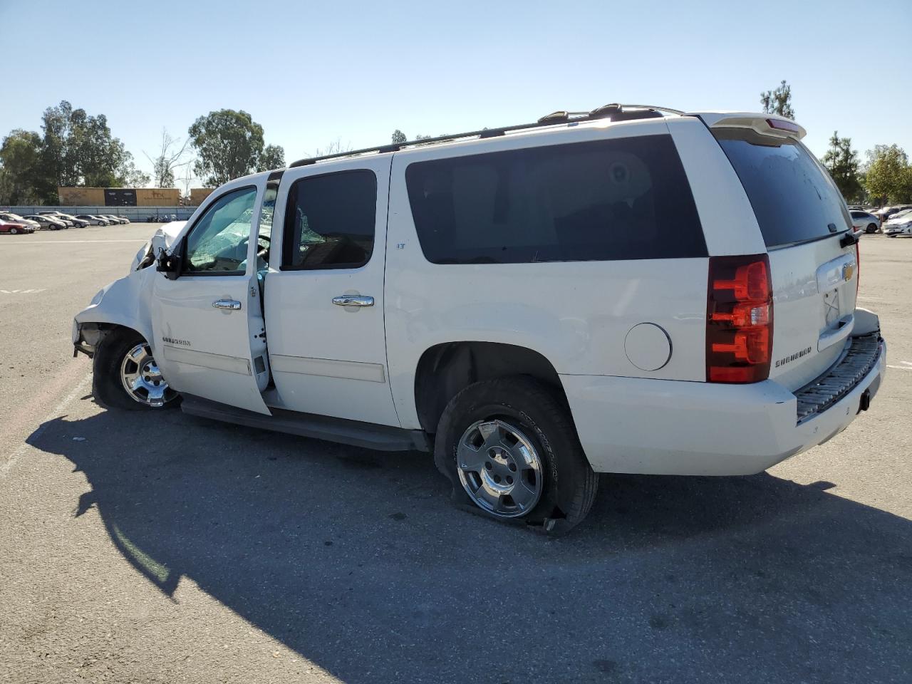 2012 Chevrolet Suburban VIN 1GNSKJE78CR156972 Copart auction photo, all over / undercarriage damage thumbnail 2