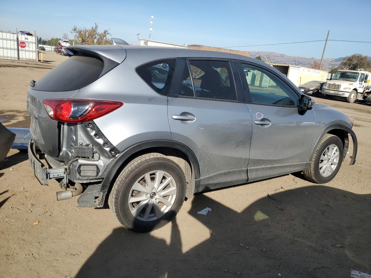 2014 Mazda CX-5 VIN JM3KE4CY0E0370074 Copart auction photo, side / rear end damage thumbnail 3