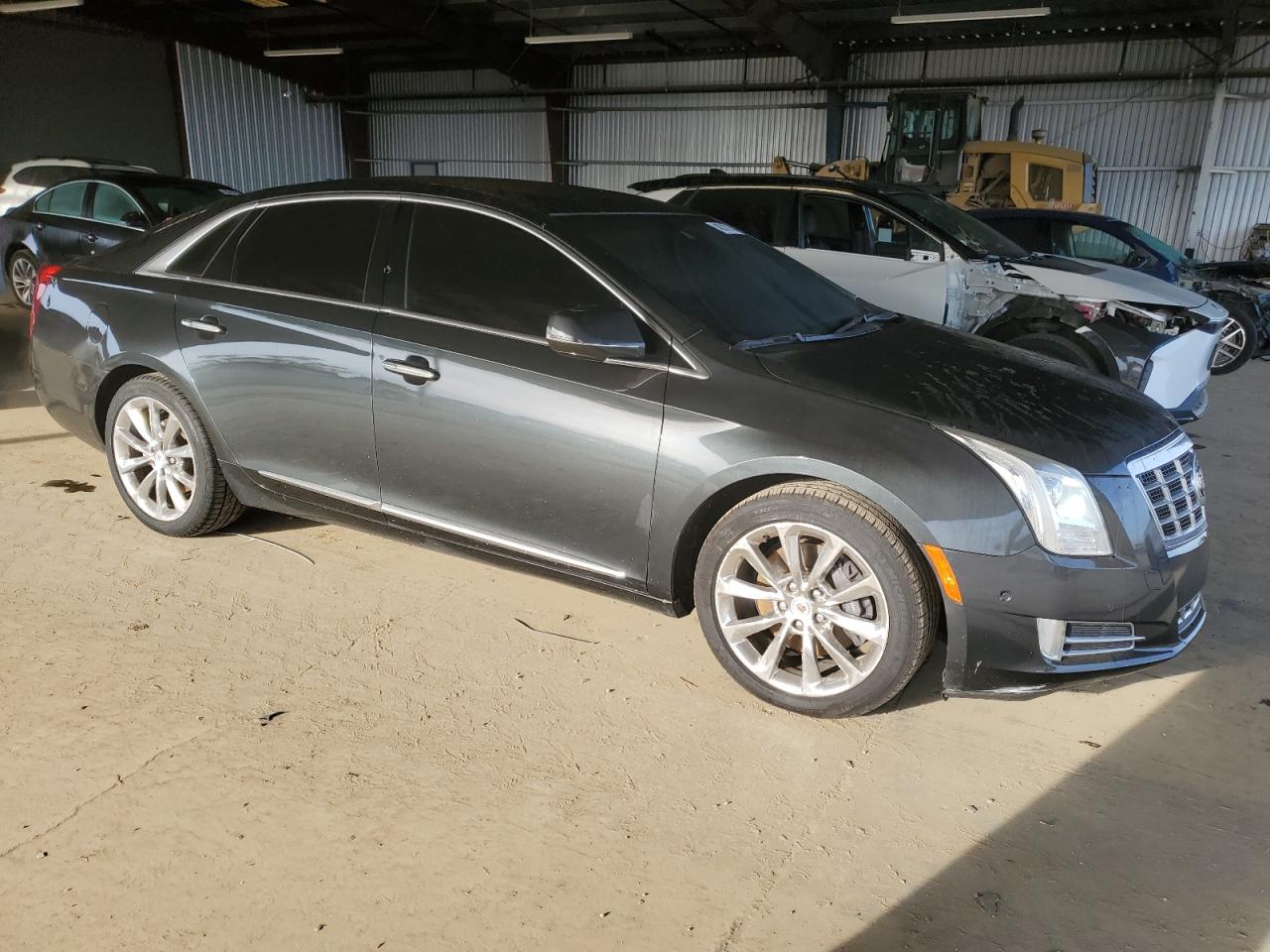 2014 Cadillac XTS VIN 2G61M5S34E9288571 Copart auction photo, vandalism damage thumbnail 4