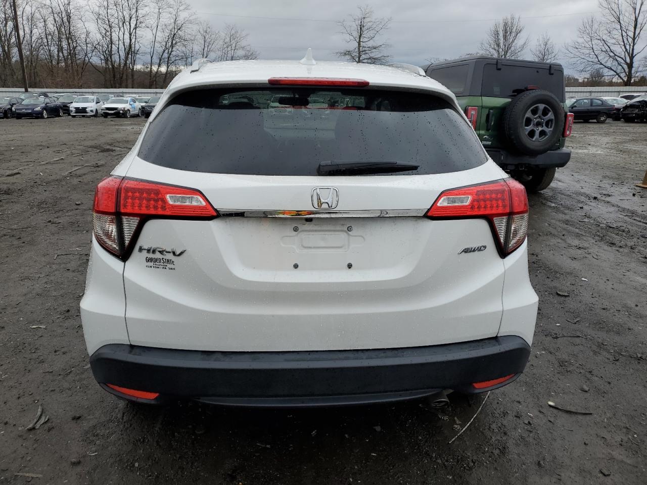 2021 Honda HR-V VIN 3CZRU6H55MM719062 Copart auction photo, side / minor dent/scratches damage thumbnail 6