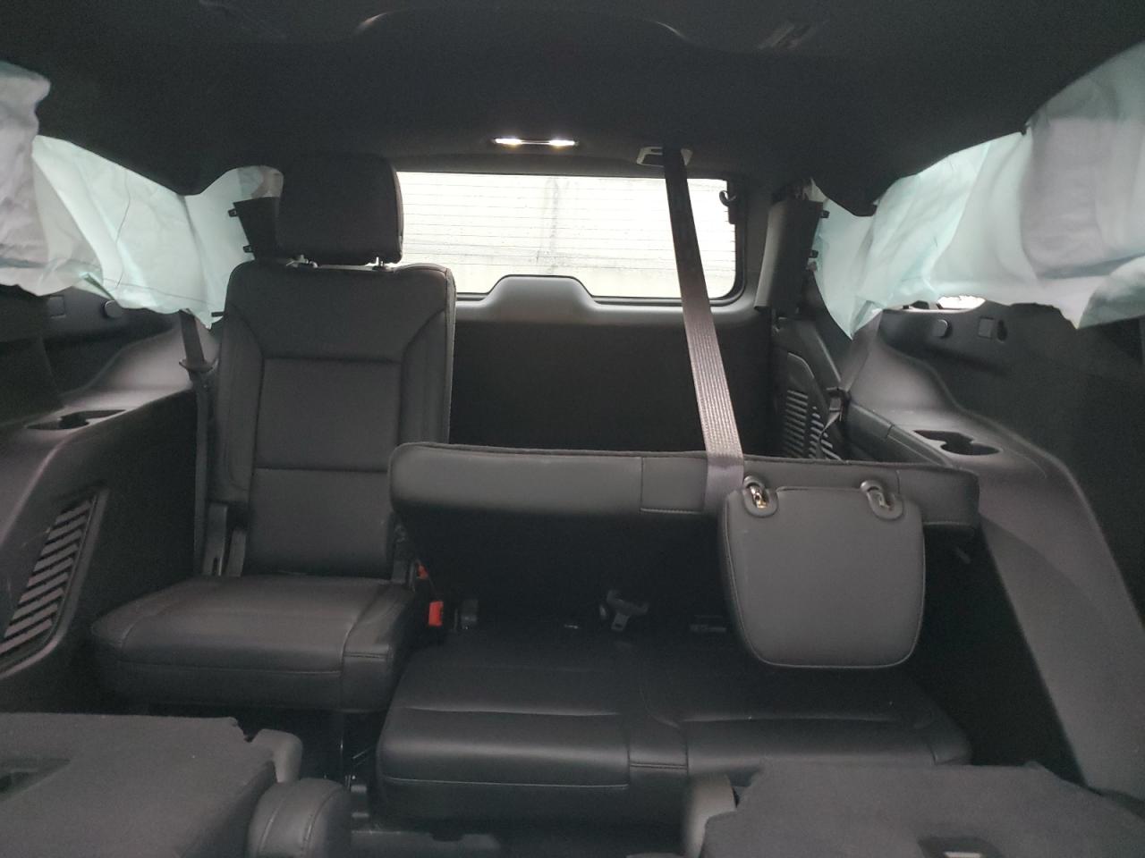 2021 Chevrolet Tahoe VIN 1GNSCNKD1MR156490 Copart auction photo, rollover / minor dent/scratches damage thumbnail 10