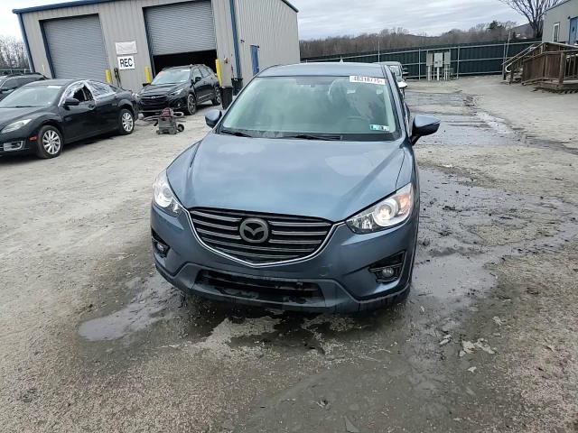 2016 Mazda CX-5 VIN JM3KE4CY4G0836172 Copart auction photo, side damage thumbnail 15