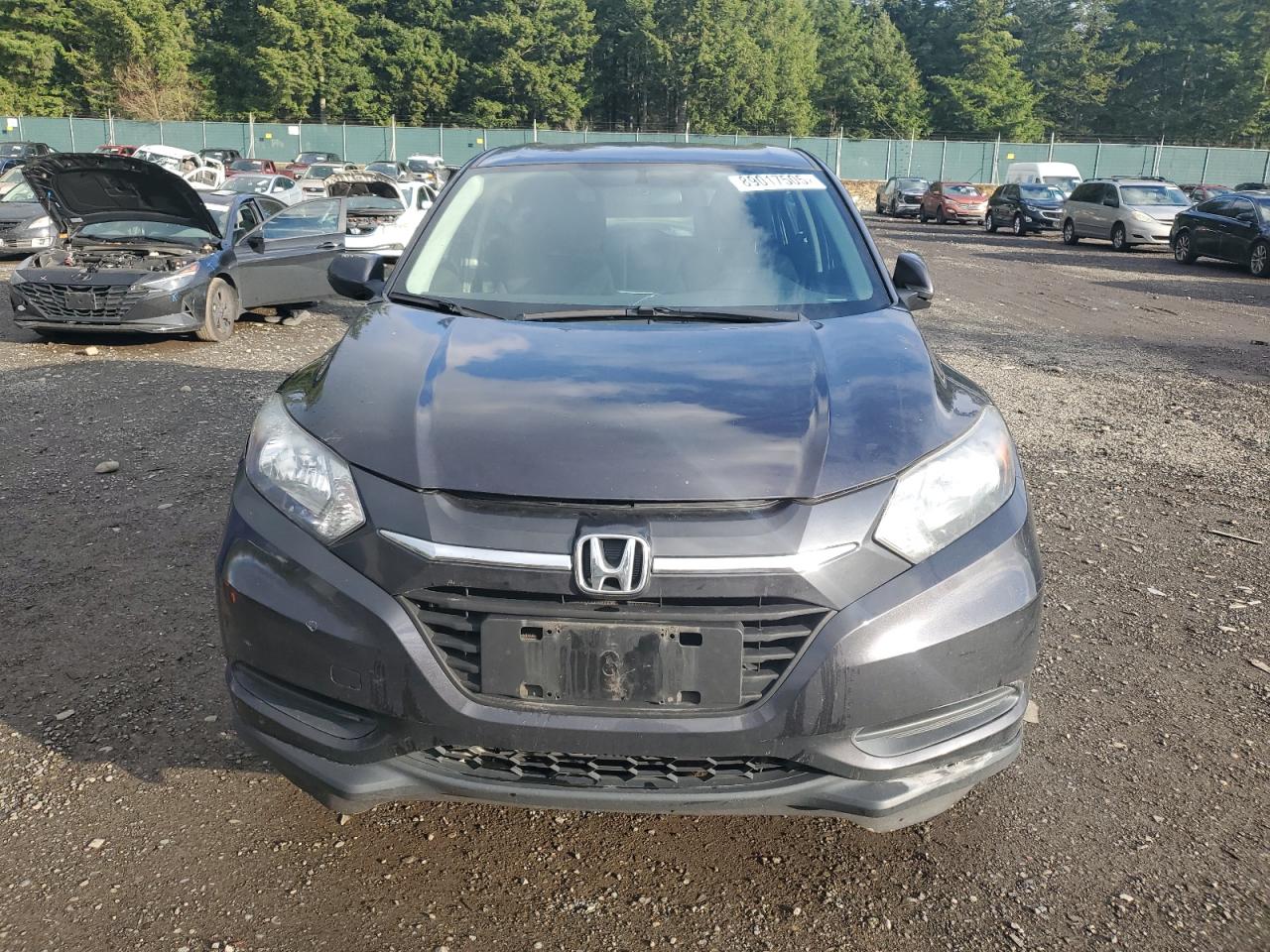 2016 Honda HR-V VIN 3CZRU6H31GM748612 Copart auction photo, front end / minor dent/scratches damage thumbnail 5