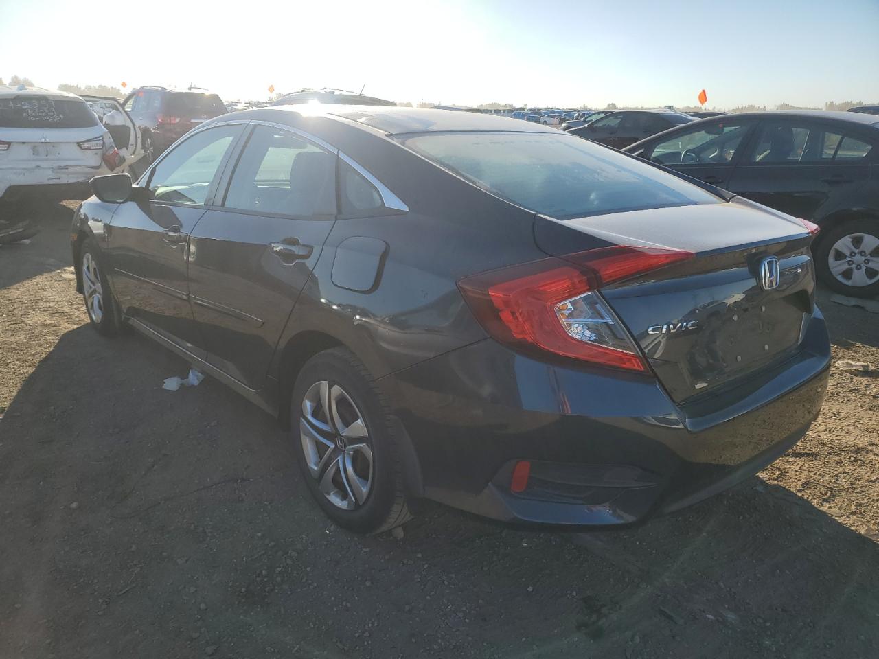 2016 Honda Civic VIN 19XFC2F5XGE055654 Copart auction photo, front end / side damage thumbnail 2