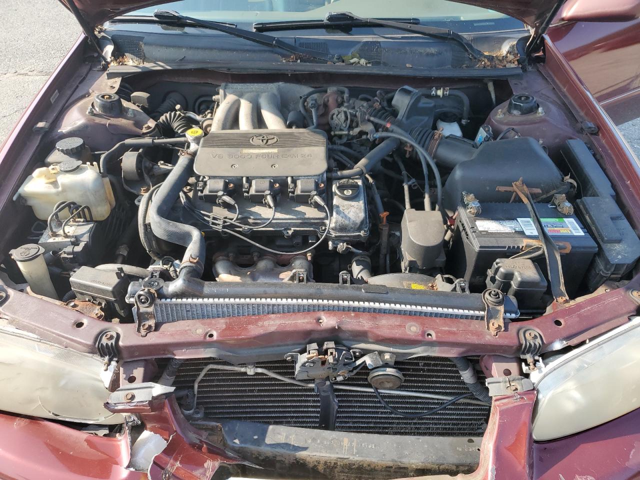 2000 Toyota Camry VIN 4T1BF28K6YU934527 Copart auction photo, front end / minor dent/scratches damage thumbnail 12