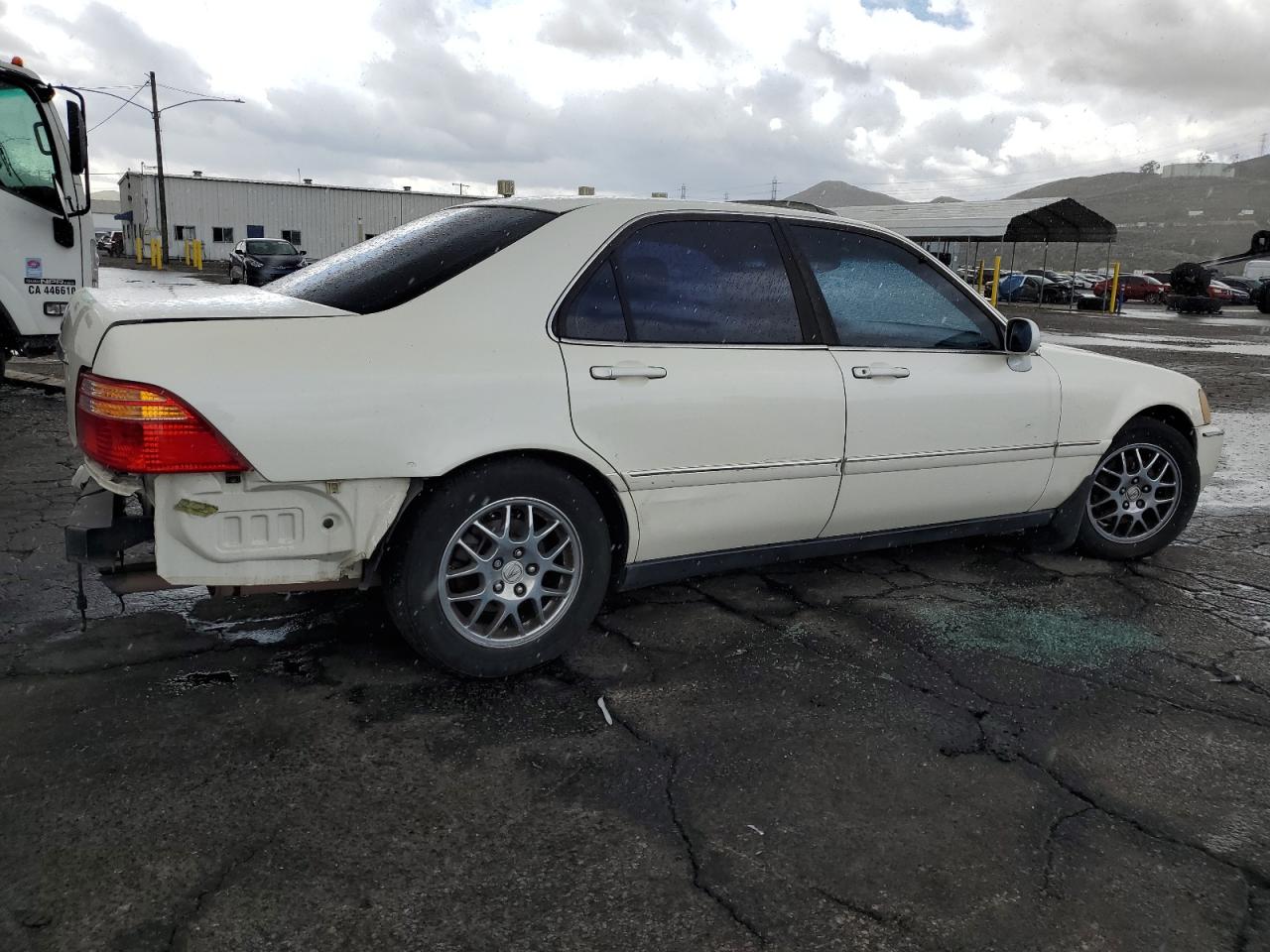 2001 Acura RL VIN JH4KA96671C001294 Copart auction photo, rear end damage thumbnail 3