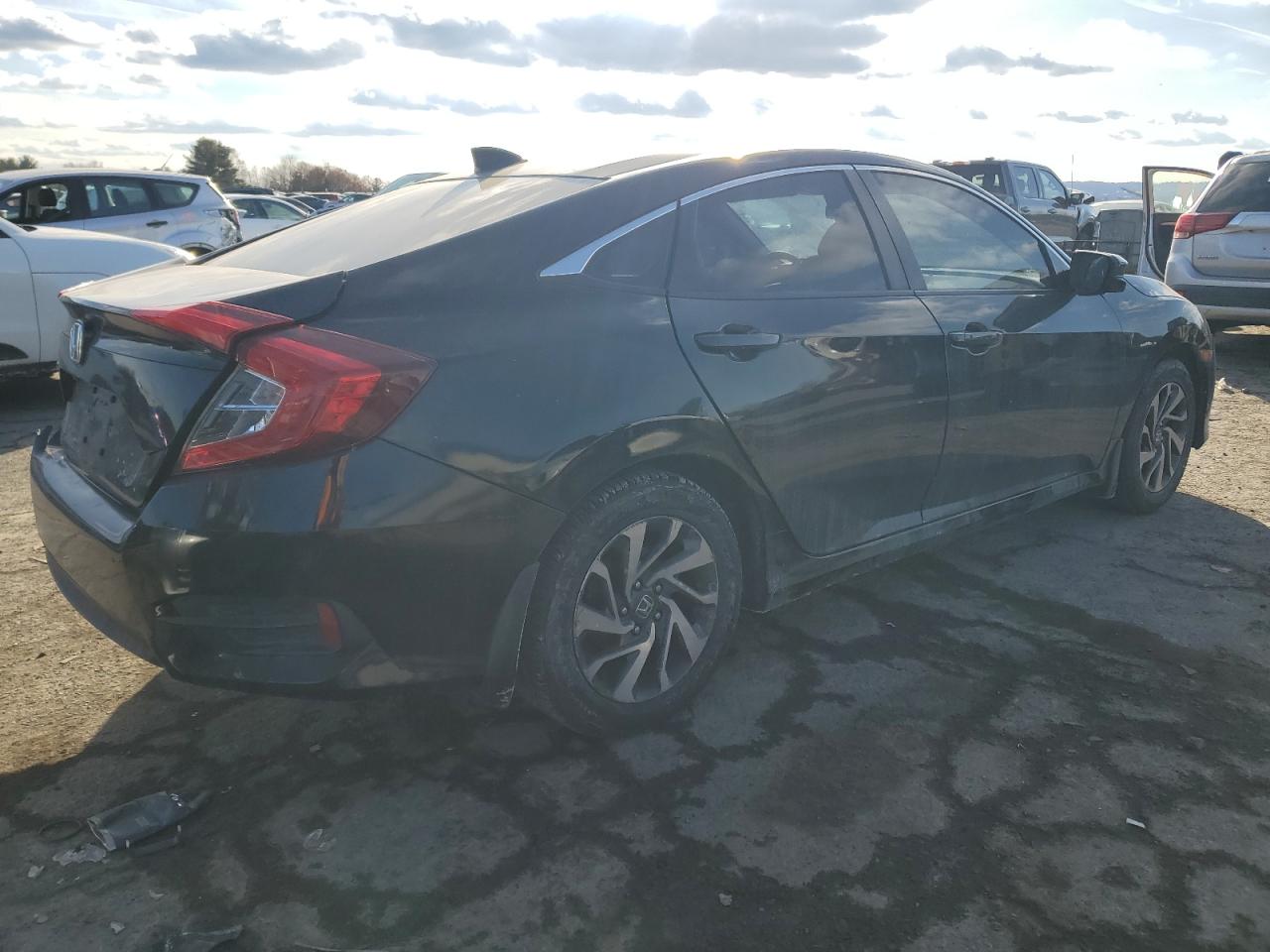 2017 Honda Civic VIN 19XFC2F75HE206998 Copart auction photo, rear end / front end damage thumbnail 3