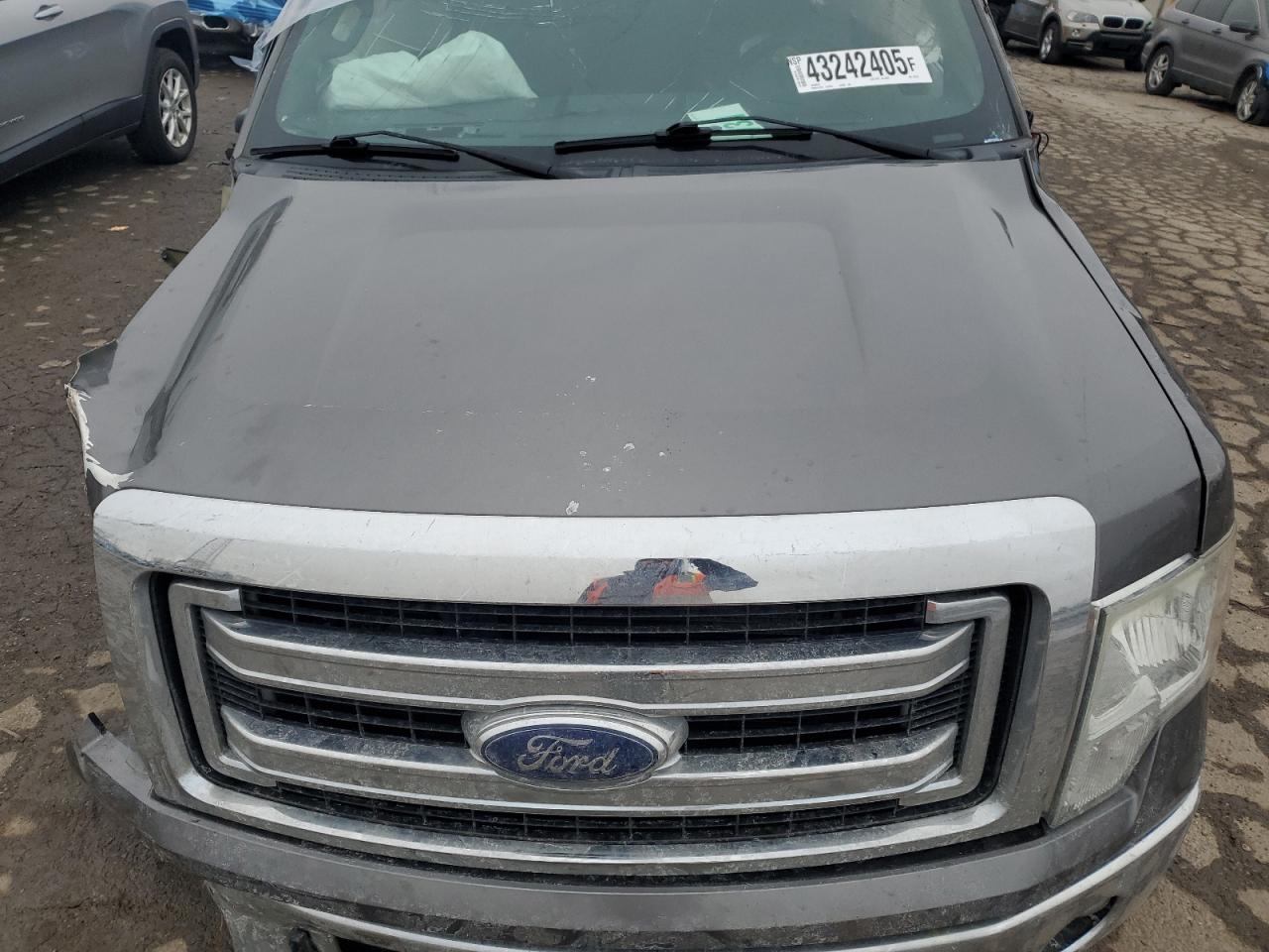 2013 Ford F-150 VIN 1FTFW1ET9DKF67352 Copart auction photo, all over damage thumbnail 11
