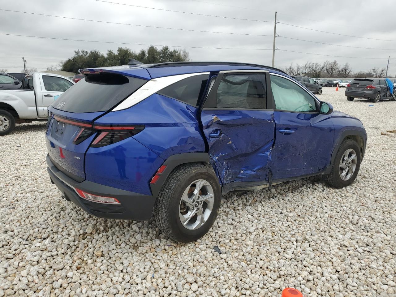 2022 Hyundai Tucson VIN 5NMJBCAEXNH029491 Copart auction photo, side damage thumbnail 3