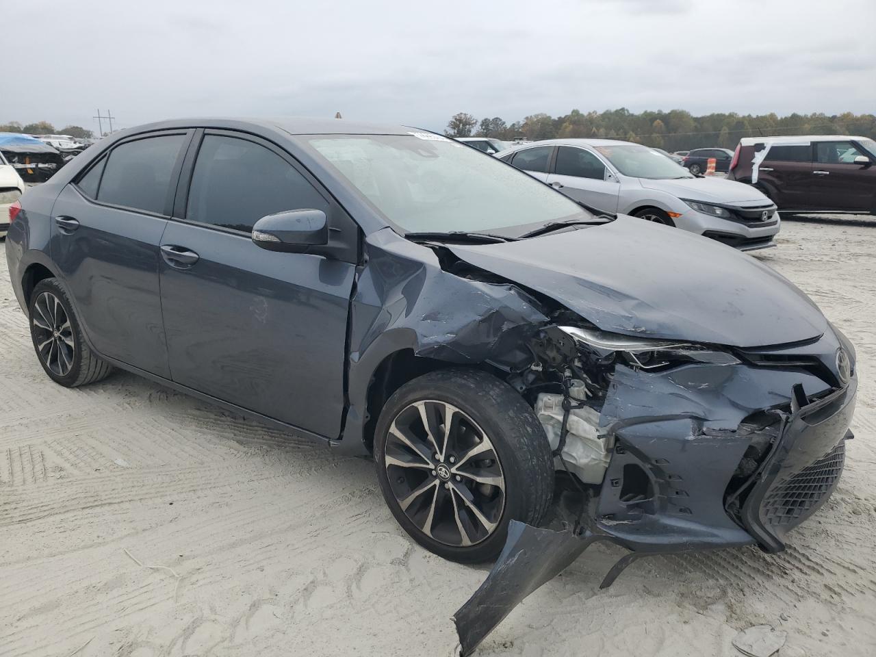 2018 Toyota Corolla VIN 5YFBURHE5JP824052 Copart auction photo, front end damage thumbnail 4