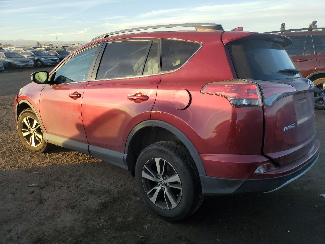 2018 Toyota RAV 4 VIN 2T3RFREV3JW704558 Copart auction photo, side / front end damage thumbnail 2