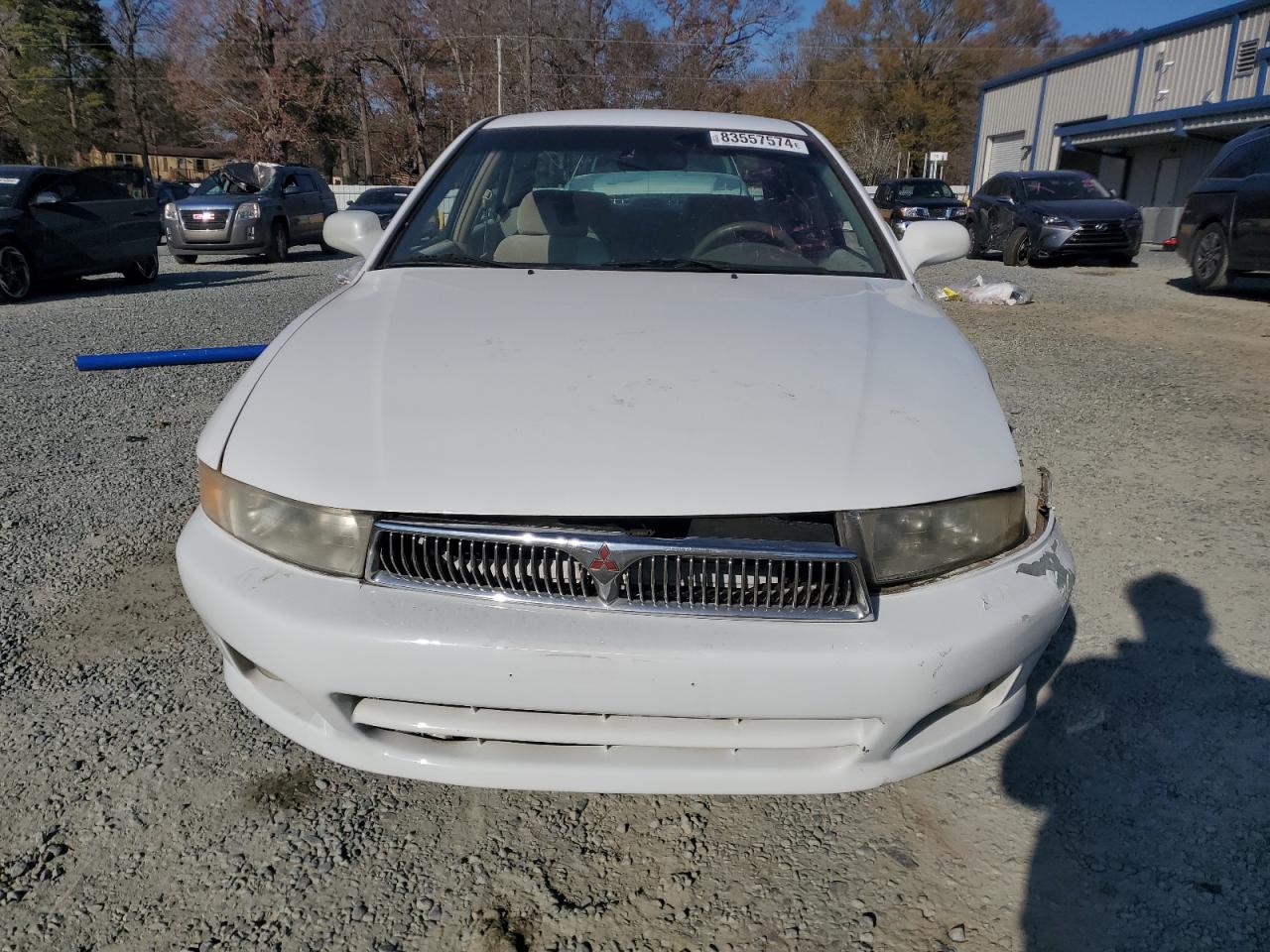 1999 Mitsubishi Galant VIN 4A3AA46G4XE050164 Copart auction photo, front end / minor dent/scratches damage thumbnail 5