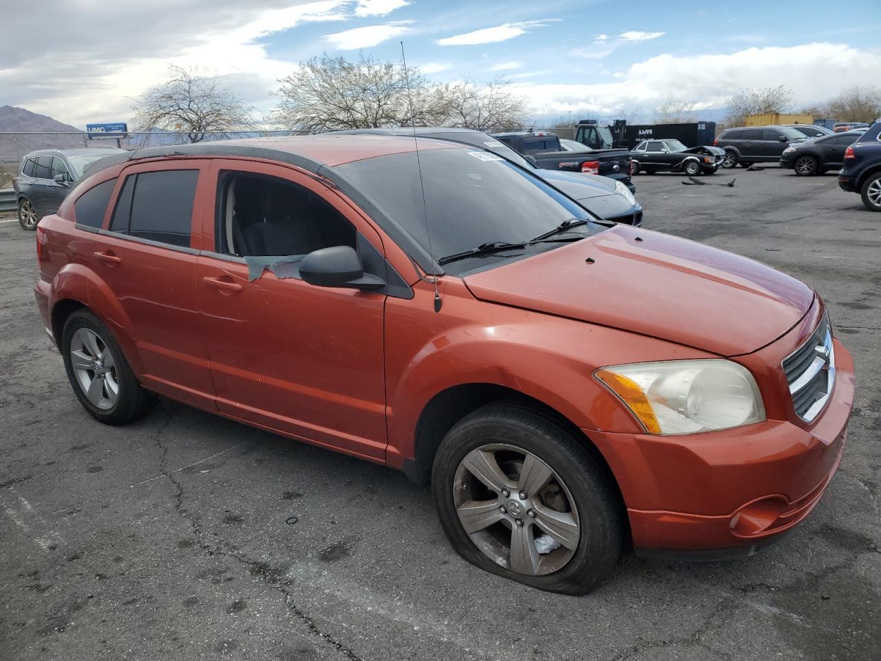 2010 Dodge Caliber VIN 1B3CB3HA7AD566920 Copart auction photo, vandalism / mechanical damage thumbnail 4