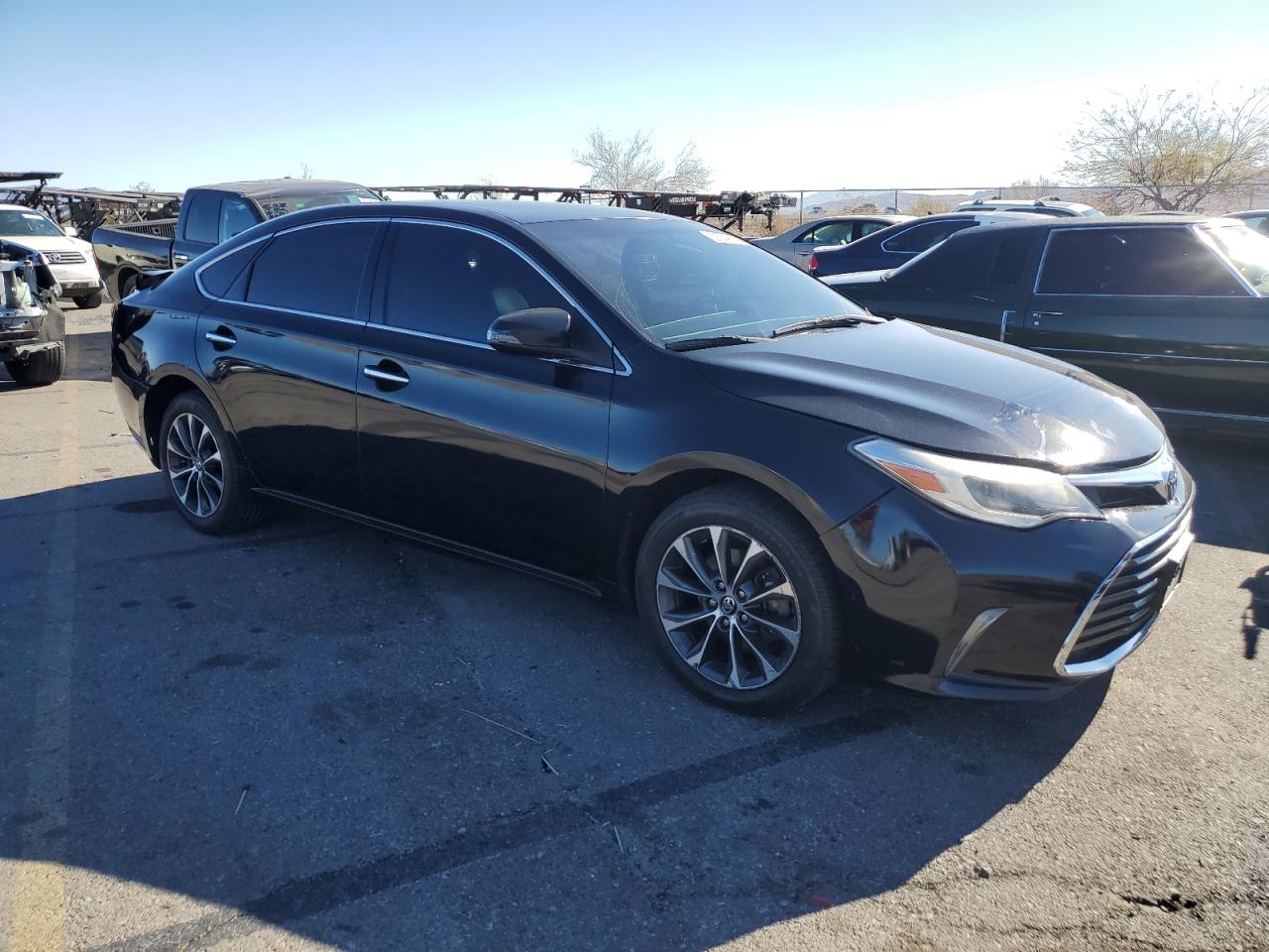 2016 Toyota Avalon VIN 4T1BK1EB7GU209236 Copart auction photo, rear end damage thumbnail 4