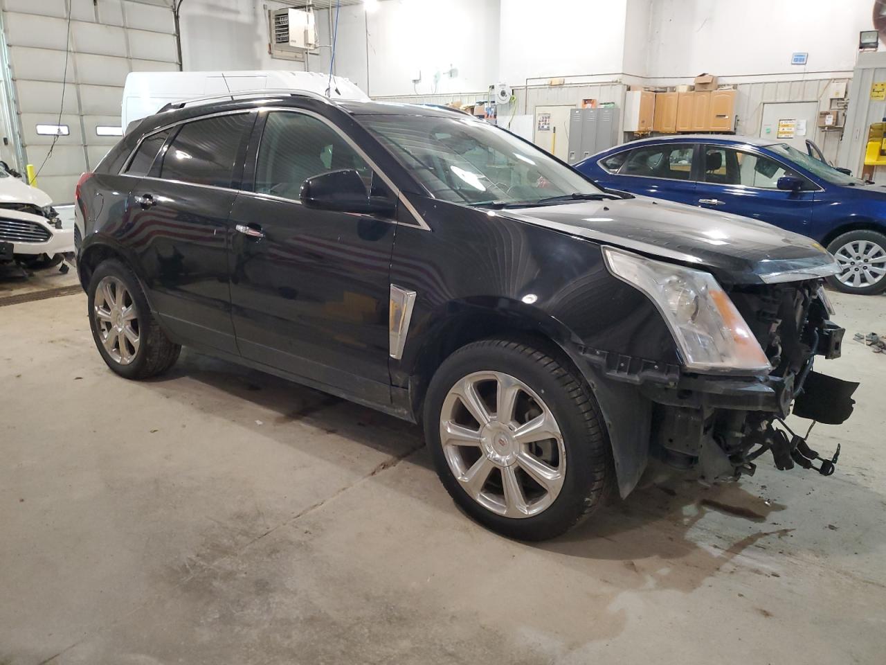 2014 Cadillac SRX VIN 3GYFNCE30ES576309 Copart auction photo, front end / minor dent/scratches damage thumbnail 4