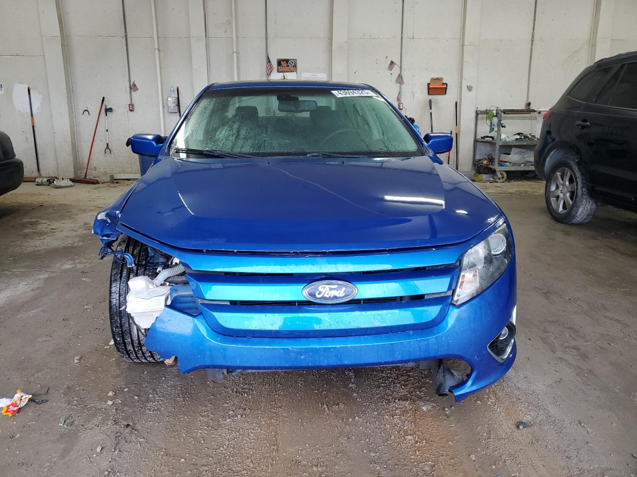 2012 Ford Fusion VIN 3FAHP0JA8CR127983 Copart auction photo, side / front end damage thumbnail 5