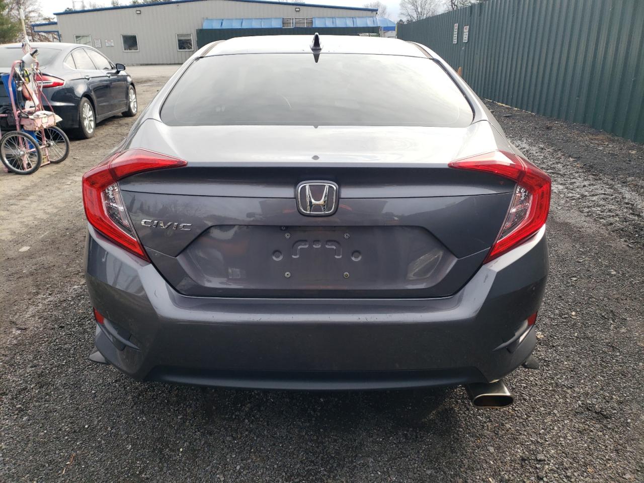 2017 Honda Civic VIN 19XFC2F8XHE210084 Copart auction photo, side / minor dent/scratches damage thumbnail 6