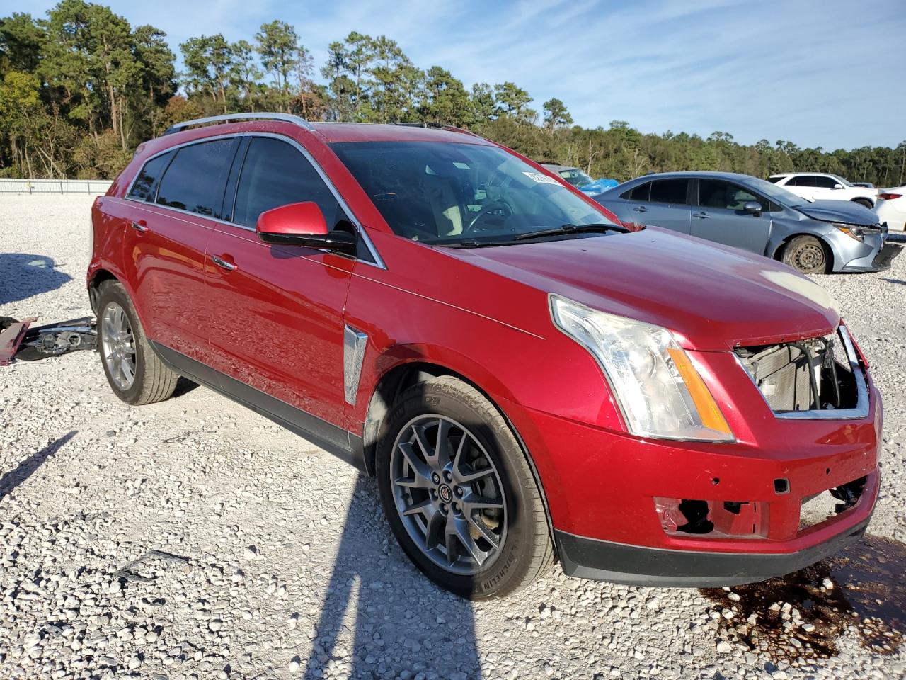 2015 Cadillac SRX VIN 3GYFNCE32FS579794 Copart auction photo, front end / side damage thumbnail 4