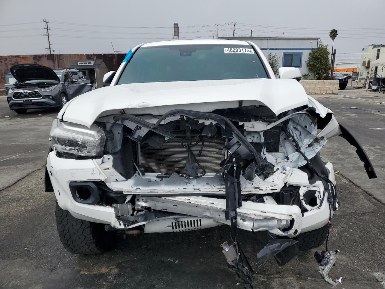 2021 Toyota Tacoma VIN 3TMCZ5AN5MM431429 Copart auction photo, front end damage thumbnail 5