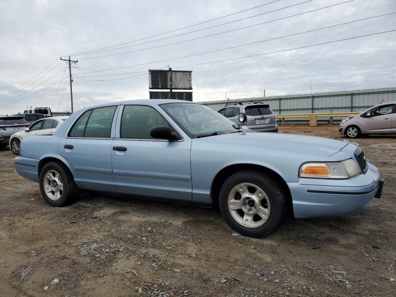 2001 Ford Crown Victoria VIN 2FAFP71W61X161009 Copart auction photo, side / front end damage thumbnail 4