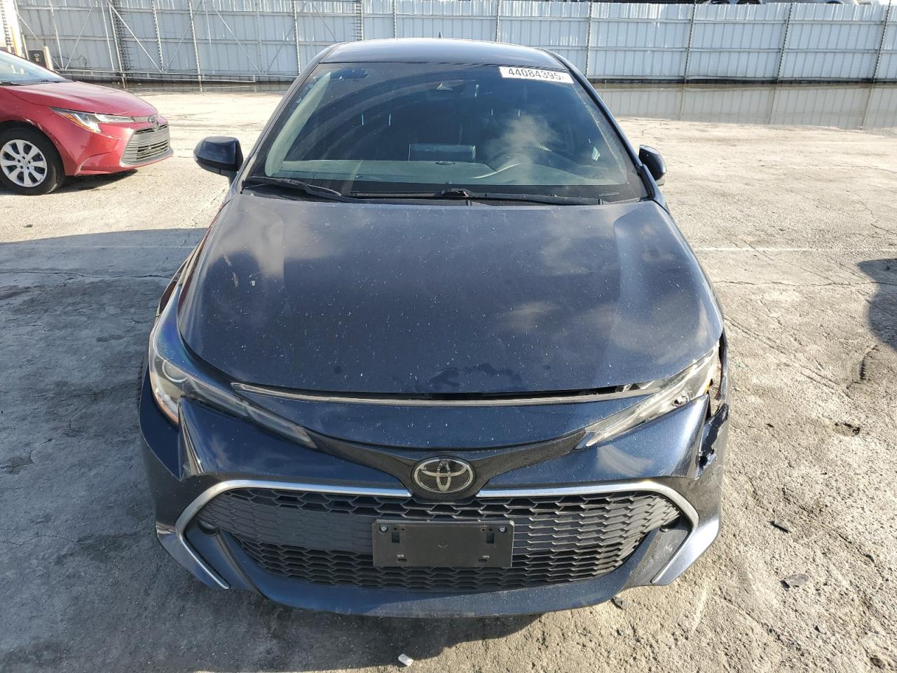 2021 Toyota Corolla VIN JTNC4MBEXM3137464 Copart auction photo, front end / side damage thumbnail 5