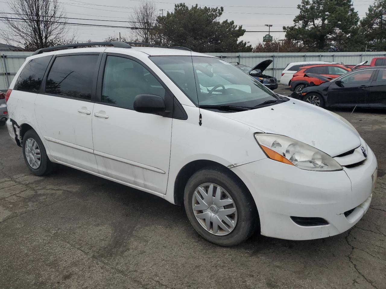 2007 Toyota Sienna VIN 5TDZK23C57S069129 Copart auction photo, rear end / minor dent/scratches damage thumbnail 4