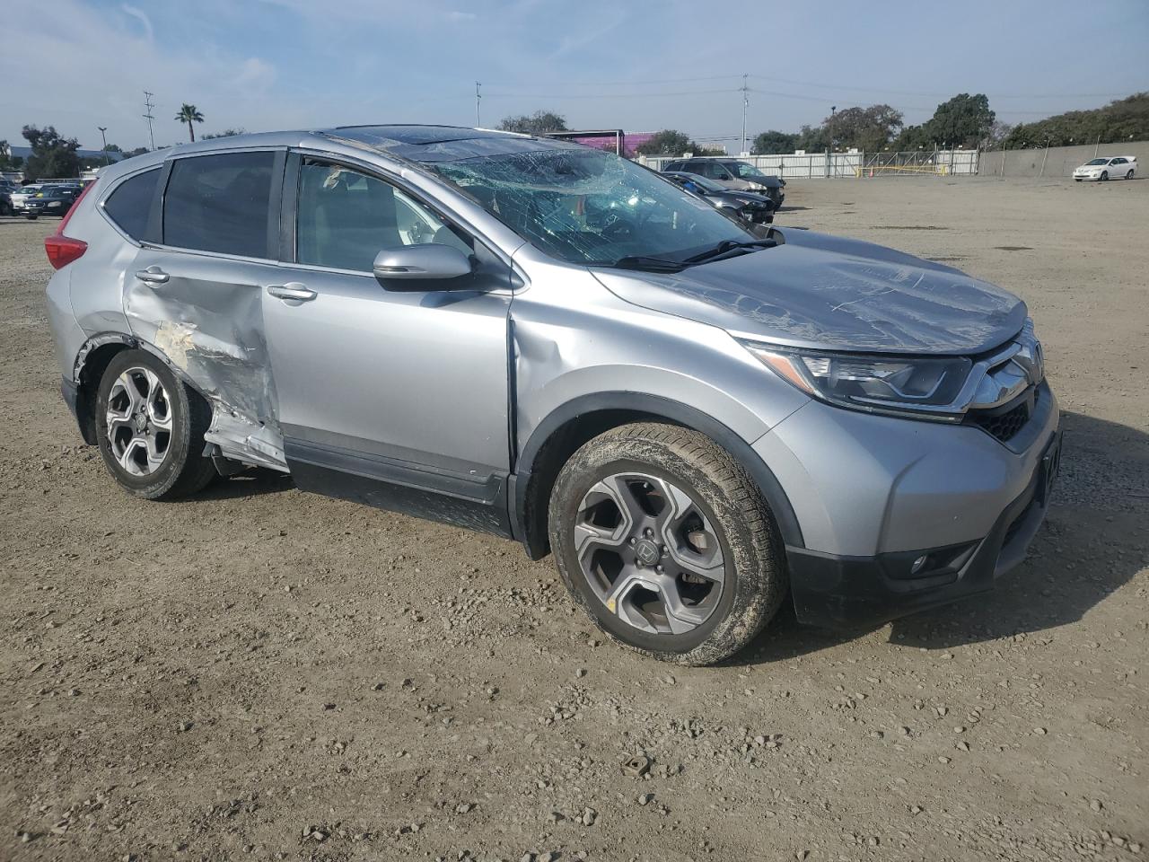 2018 Honda CR-V VIN 7FARW2H80JE104054 Copart auction photo, rollover damage thumbnail 4