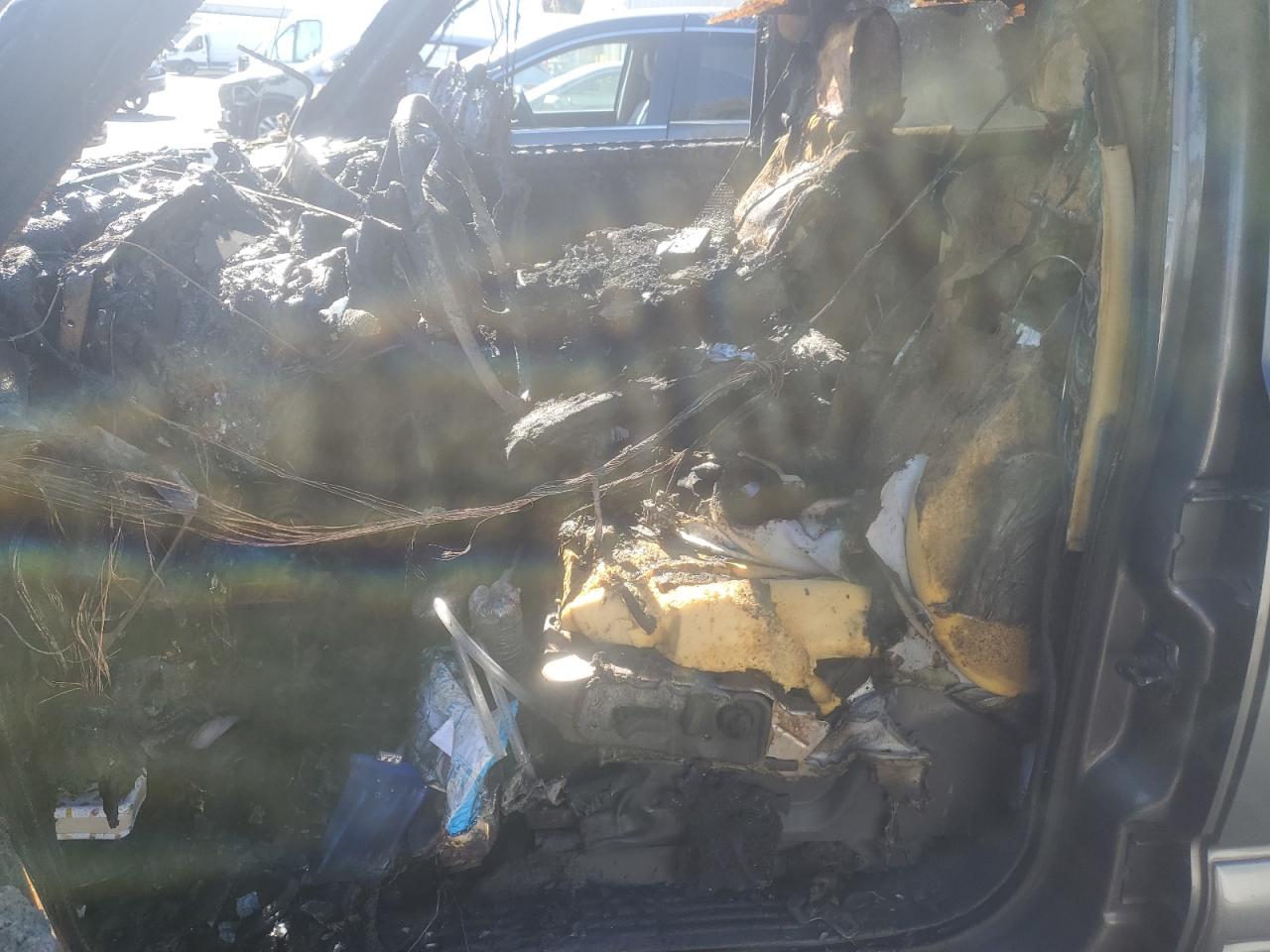 2002 Chevrolet Tahoe VIN 1GNEC13T82R134706 Copart auction photo, burn damage thumbnail 7