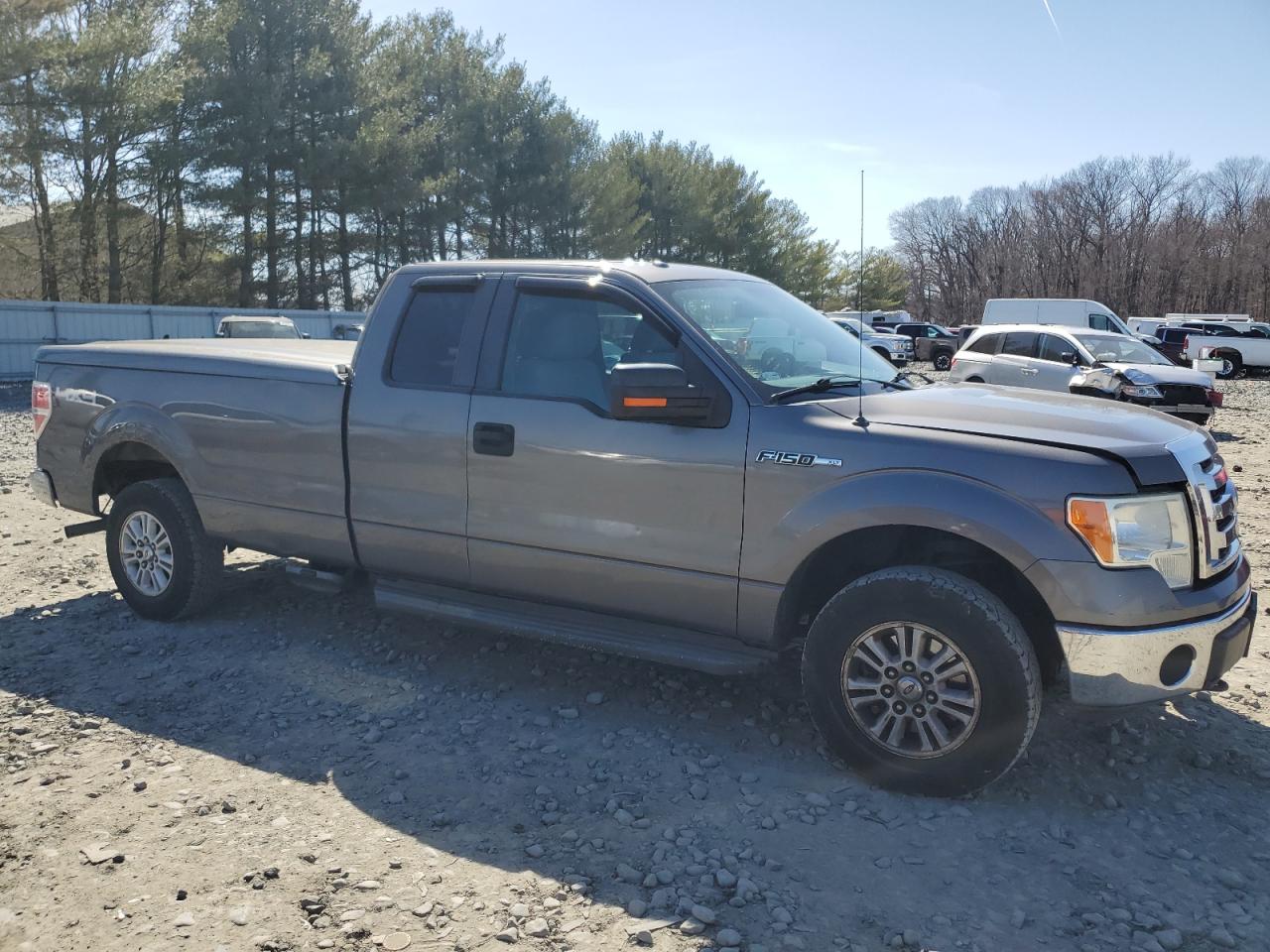 2011 Ford F-150 VIN 1FTVX1EF3BKD43090 Copart auction photo, rear end damage thumbnail 5