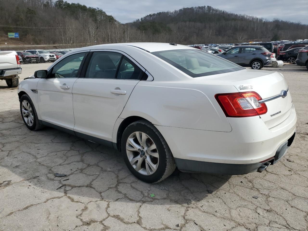 2010 Ford Taurus VIN 1FAHP2EW4AG106893 Copart auction photo, all over damage thumbnail 2
