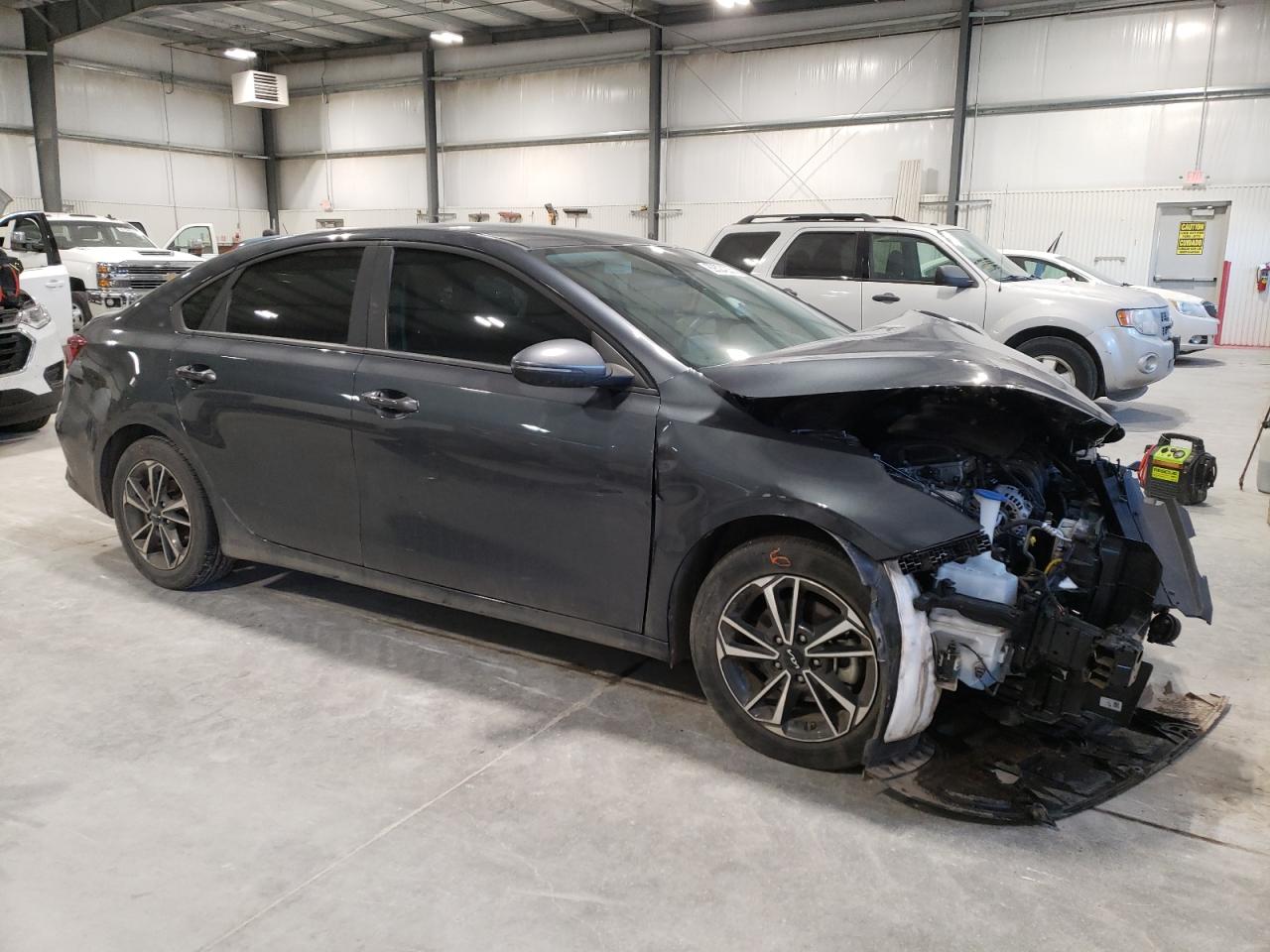 2023 KIA Forte VIN 3KPF24ADXPE566990 Copart auction photo, all over damage thumbnail 4