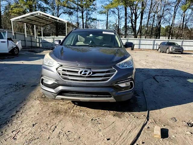 2017 Hyundai Santa Fe VIN 5XYZU3LB8HG446123 Copart auction photo, rear end / front end damage thumbnail 15