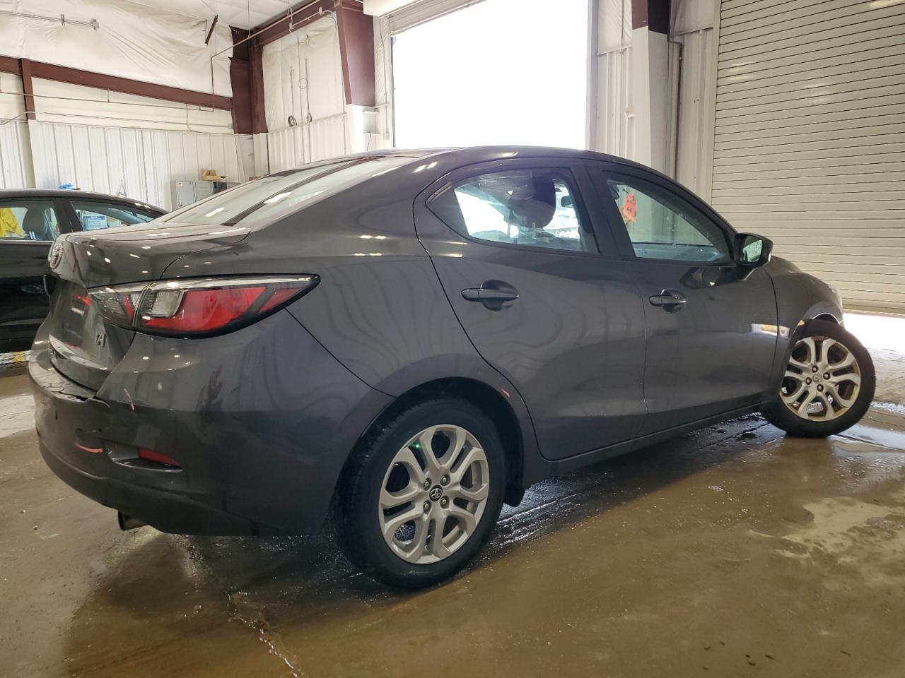 2017 Toyota Yaris VIN 3MYDLBYV3HY164138 Copart auction photo, undercarriage / rear end damage thumbnail 3