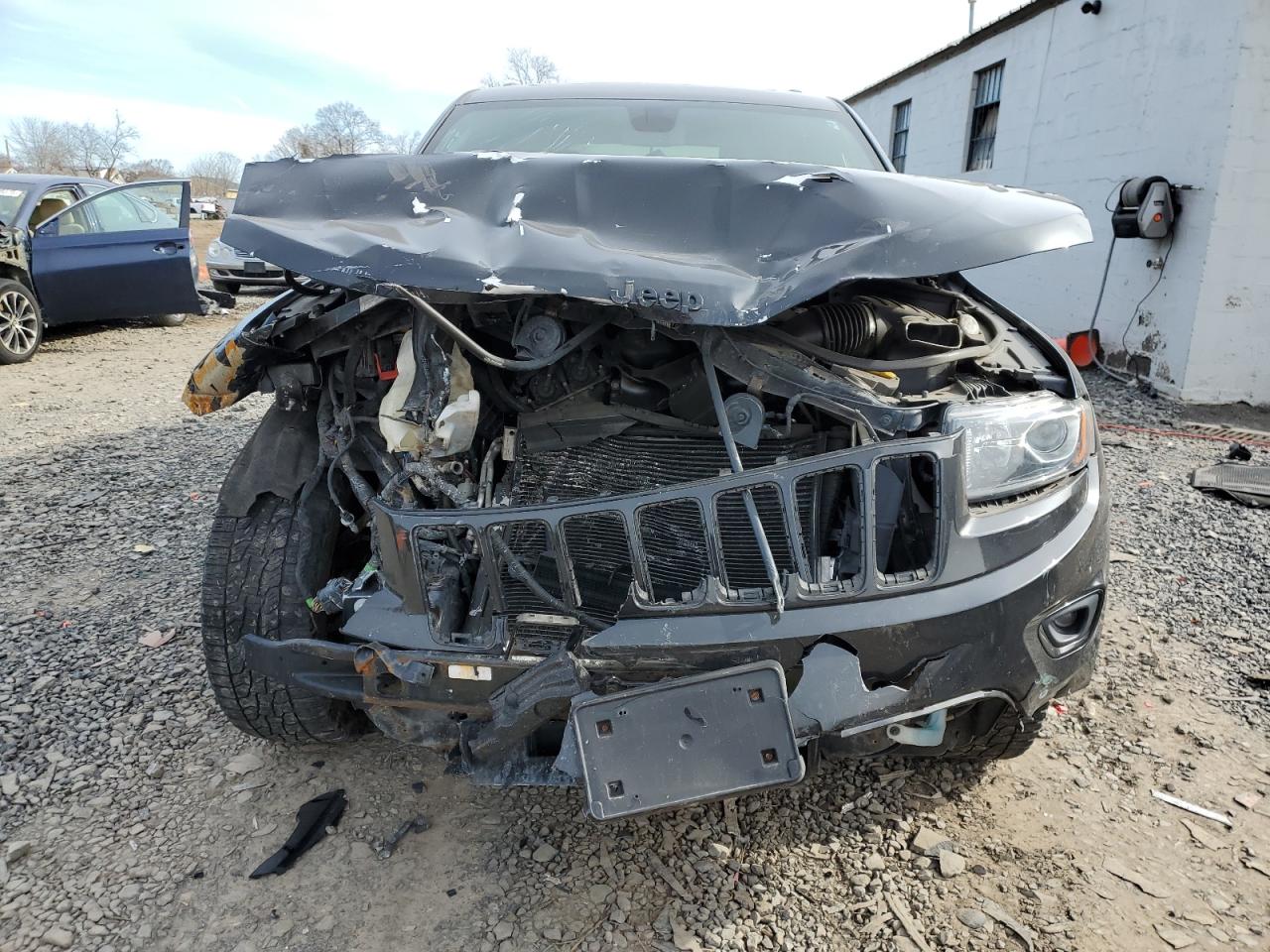 2014 Jeep Grand Cherokee VIN 1C4RJFAG1EC569092 Copart auction photo, front end damage thumbnail 5