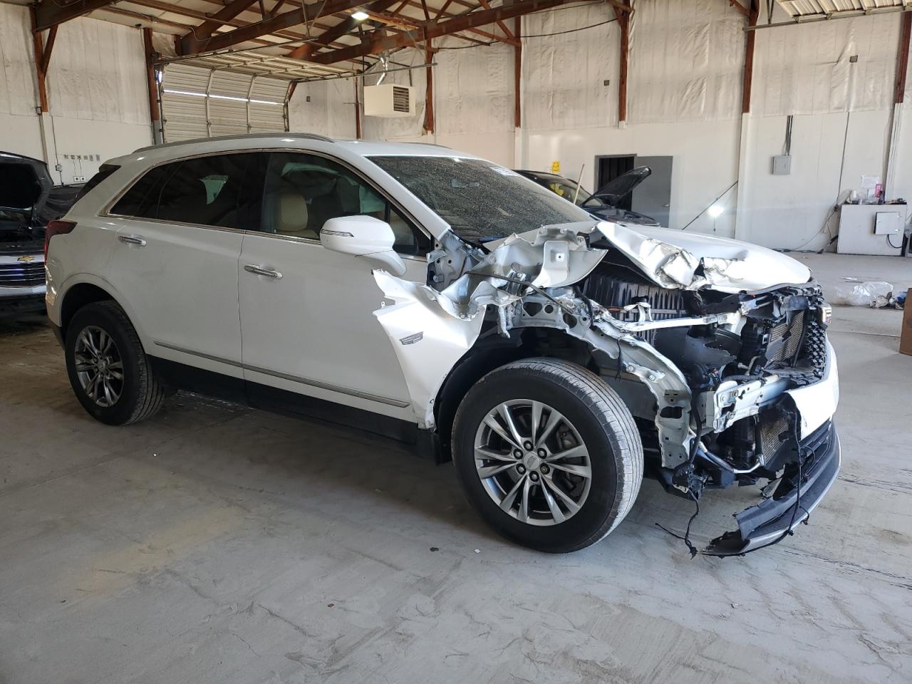 2020 Cadillac XT5 VIN 1GYKNCRS9LZ235779 Copart auction photo, front end / frame damage damage thumbnail 4
