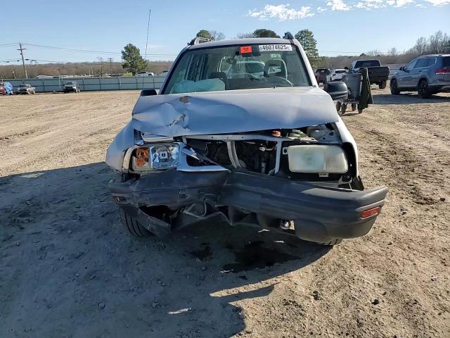 2004 Chevrolet Tracker VIN 2CNBE134846906856 Copart auction photo, front end / side damage thumbnail 12