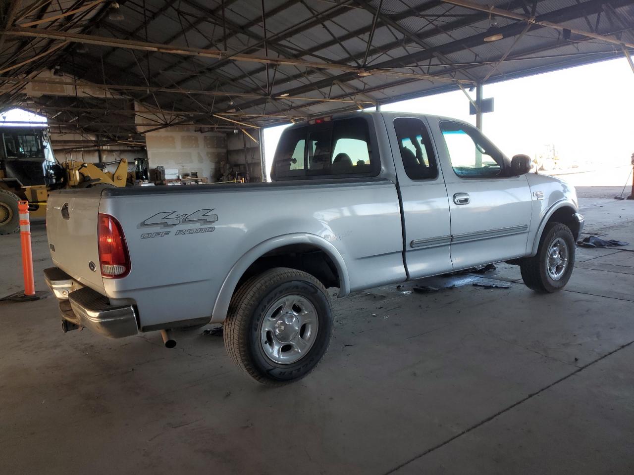 1999 Ford F-150 VIN 1FTRX18L3XNA88322 Copart auction photo, front end damage thumbnail 3