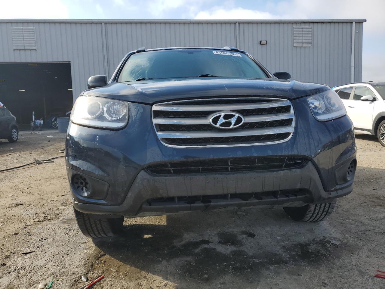 2012 Hyundai Santa Fe VIN 5XYZG3AB7CG159195 Copart auction photo, rear end damage thumbnail 5