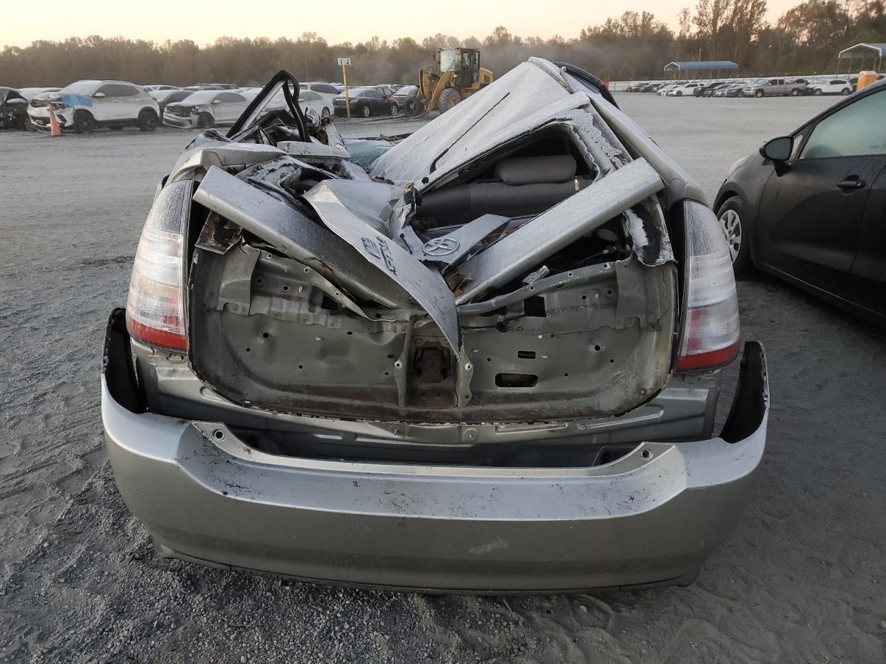 2005 Toyota Prius VIN JTDKB22UX57021144 Copart auction photo, top/roof damage thumbnail 6