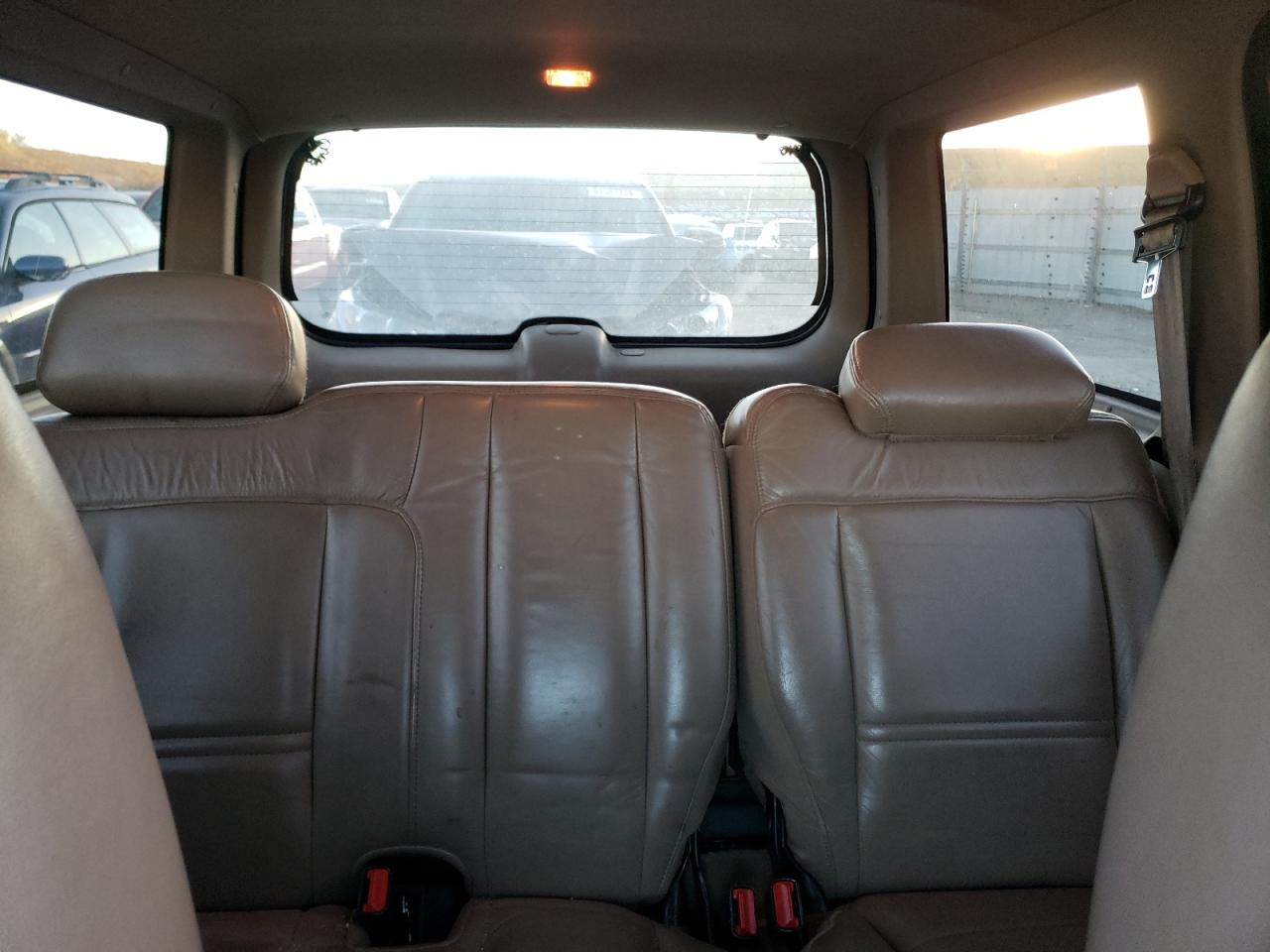 1999 Ford Explorer VIN 1FMZU35P8XZA31923 Copart auction photo, rear end / hail damage thumbnail 10