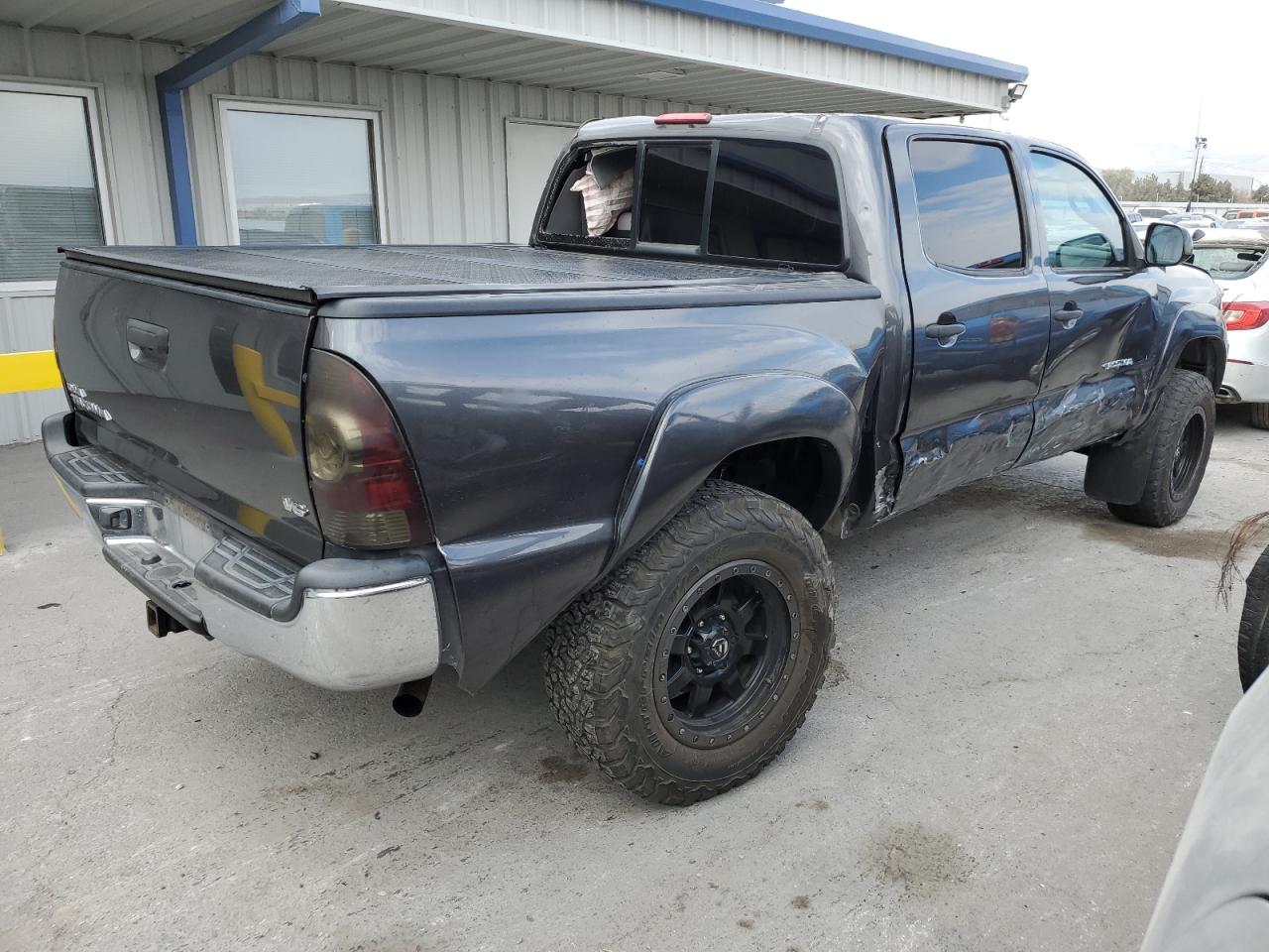 2014 Toyota Tacoma VIN 3TMLU4EN3EM147754 Copart auction photo, rollover damage thumbnail 3