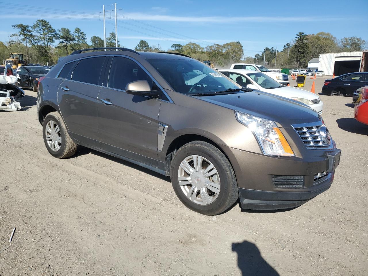 2015 Cadillac SRX VIN 3GYFNAE37FS608842 Copart auction photo, side / front end damage thumbnail 4