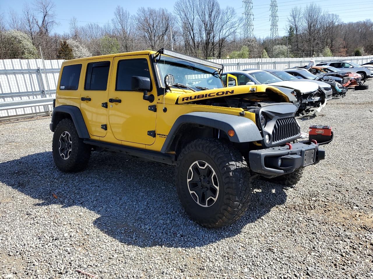 2015 Jeep Wrangler VIN 1C4BJWFG0FL561769 Copart auction photo, front end / side damage thumbnail 4