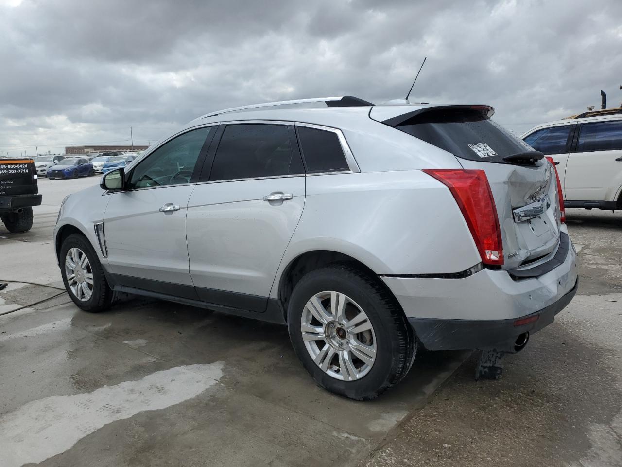 2015 Cadillac SRX VIN 3GYFNEE36FS520307 Copart auction photo, rear end / minor dent/scratches damage thumbnail 2